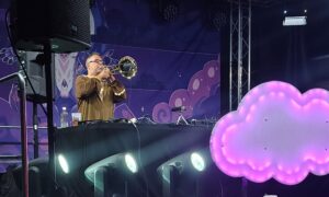 Jack playing solo ambient on trombone at Purple Clouds 2026